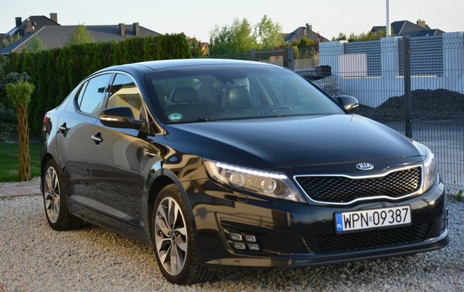 Kia Optima cena 51700 przebieg: 210098, rok produkcji 2014 z Płońsk małe 781